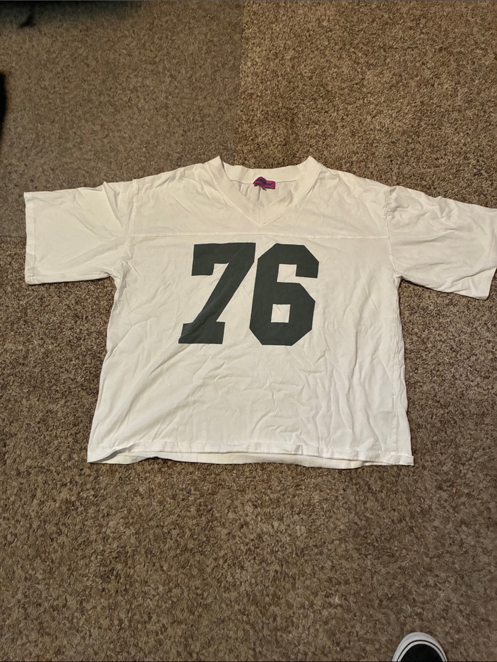 Edikted White V‑Neck Tee with Pink & Teal Logo Tag